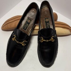 Gucci Men's Black Leather Loafers with Gold Accents